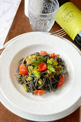 Black spaghetti Marinara with cuttlefish ink, salted capers and sweet paprika